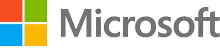 A gray microsoft logo is shown on the side of a wall.